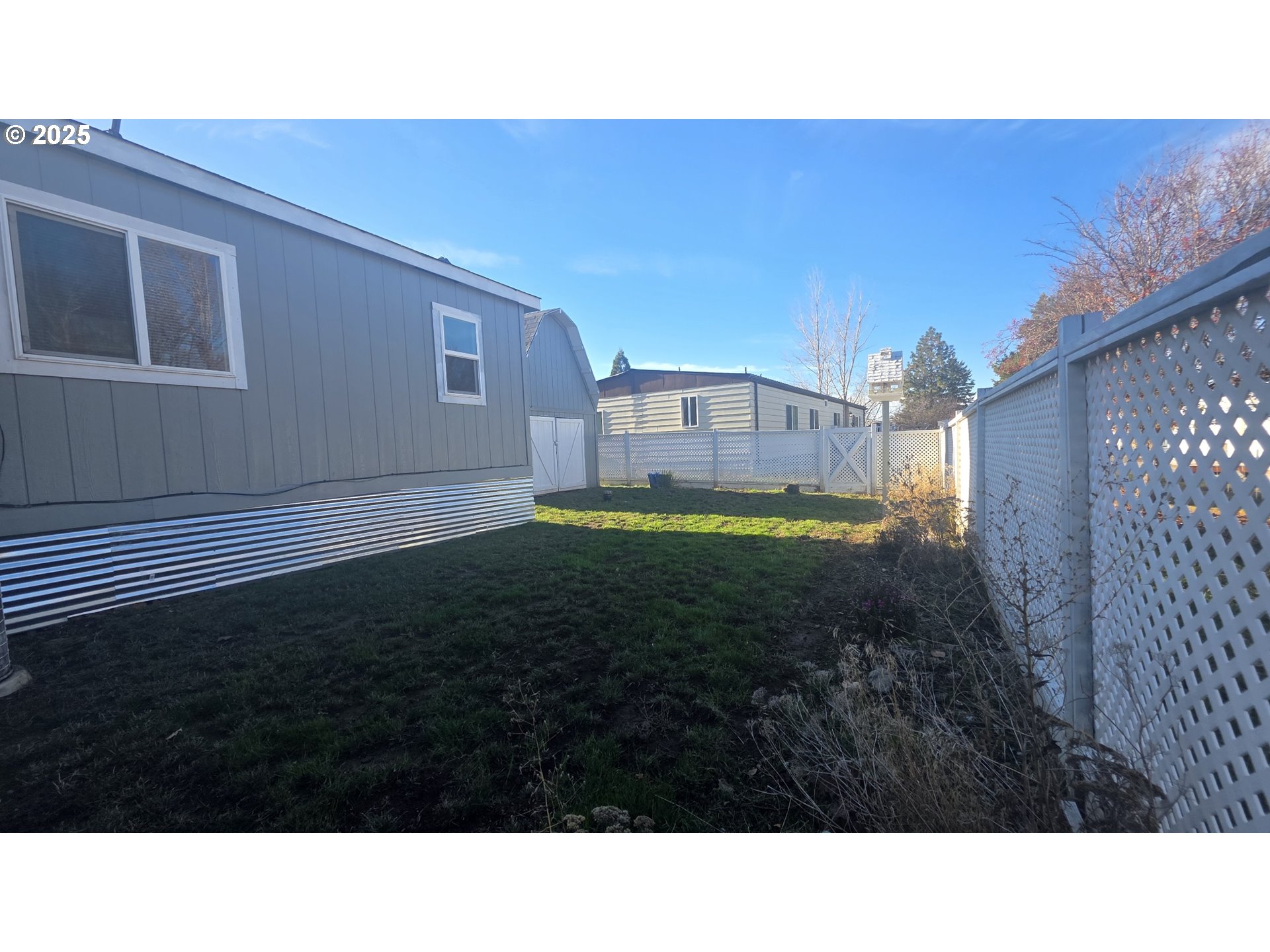1500 South Columbus Avenue, Unit 38 Goldendale, WA 98620 - Photo 5 of 30 a black and white photo of a house