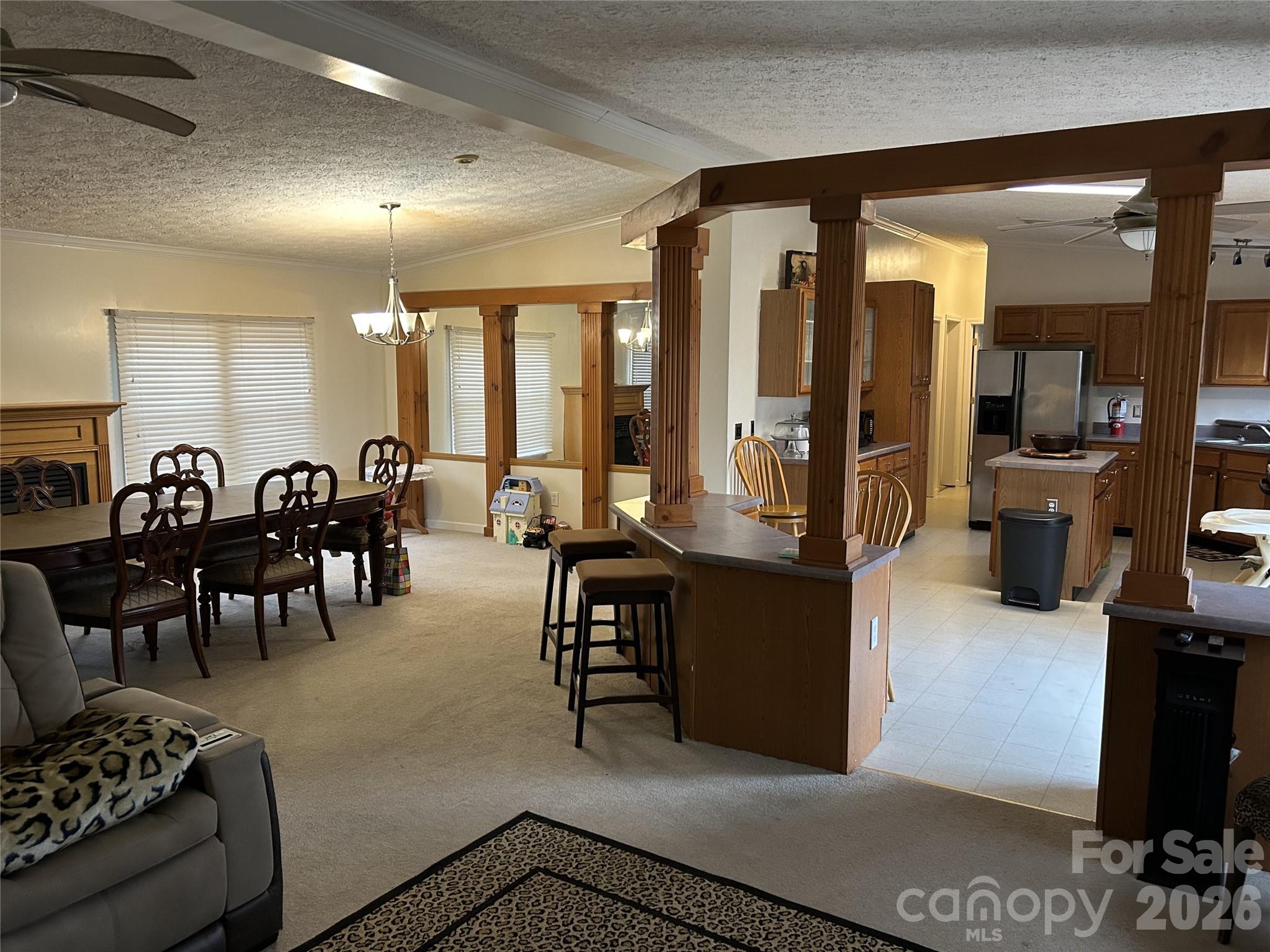 322 Balmy Lane Rutherfordton, NC 28139 - Photo 11 of 34 a living room with furniture a dining table and chairs