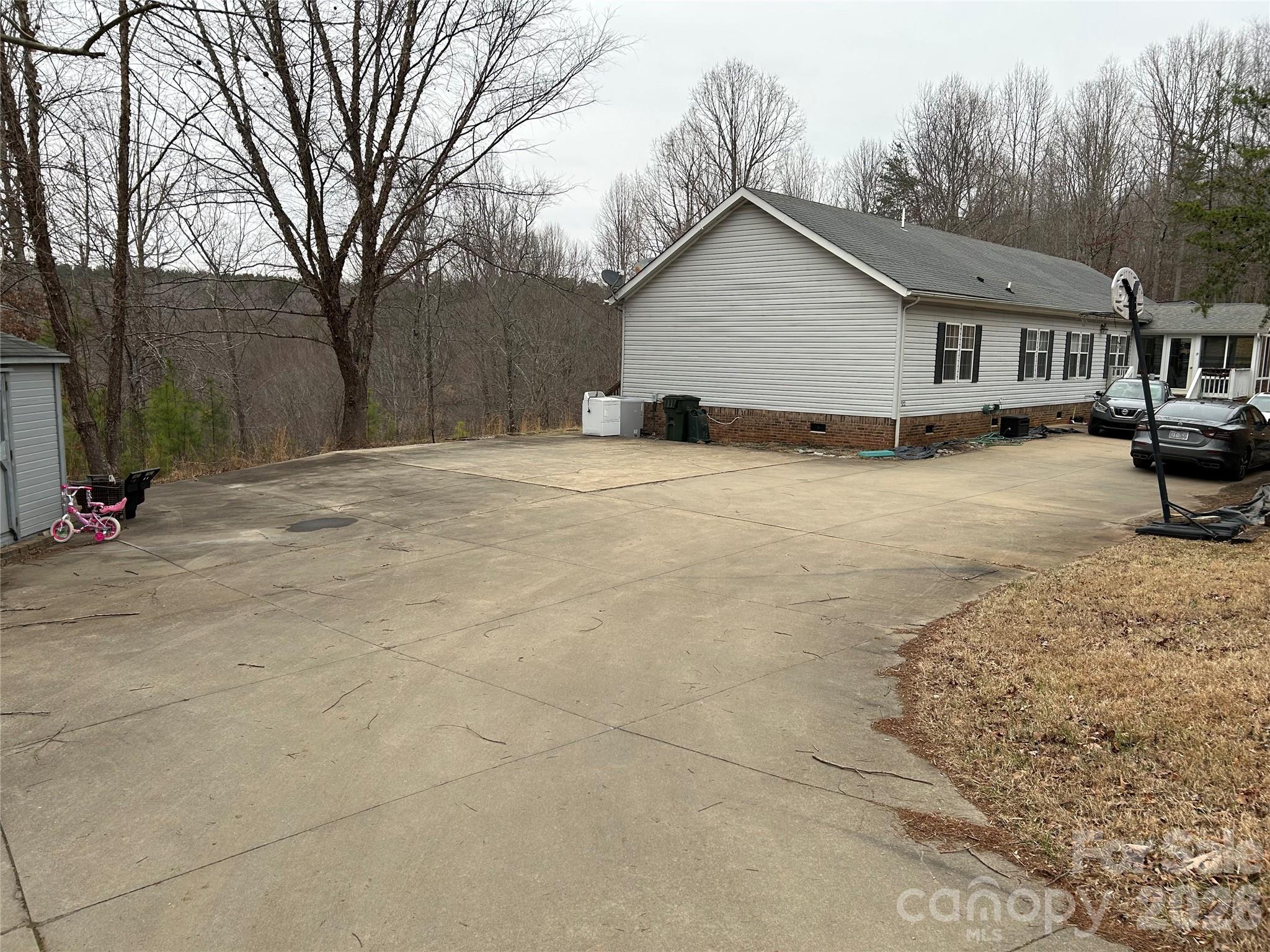 322 Balmy Lane Rutherfordton, NC 28139 - Photo 3 of 34 a view of a house with a yard covered in snow