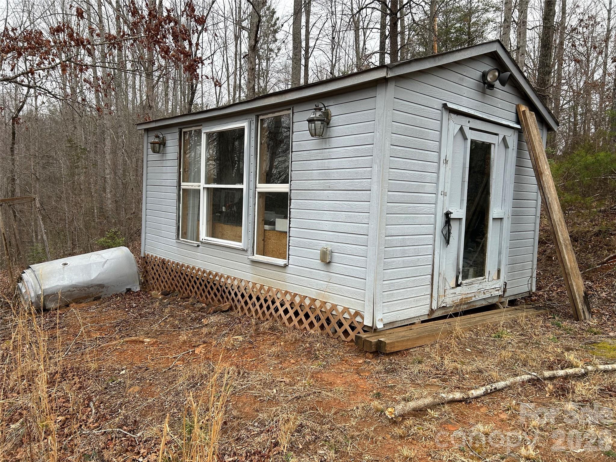 322 Balmy Lane Rutherfordton, NC 28139 - Photo 32 of 34 a front view of a house with a yard
