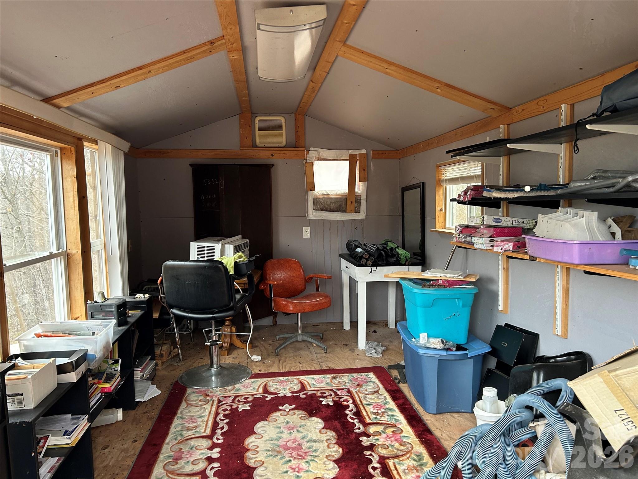 322 Balmy Lane Rutherfordton, NC 28139 - Photo 33 of 34 a work room with furniture a rug and a window