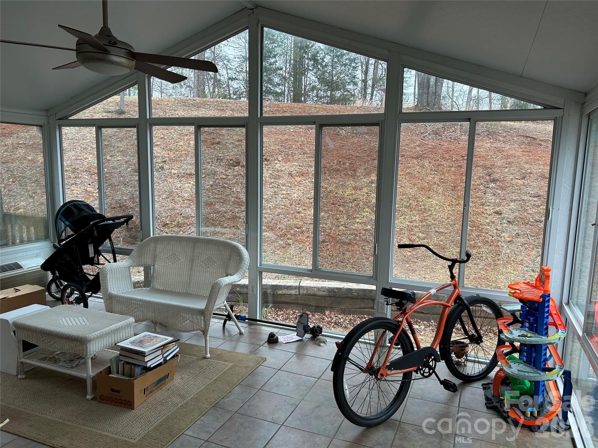 322 Balmy Lane Rutherfordton, NC 28139 - Photo 6 of 34 a living room with furniture and floor to ceiling windows