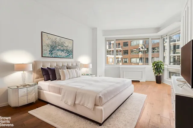 a kitchen with stainless steel appliances granite countertop a stove and a microwave