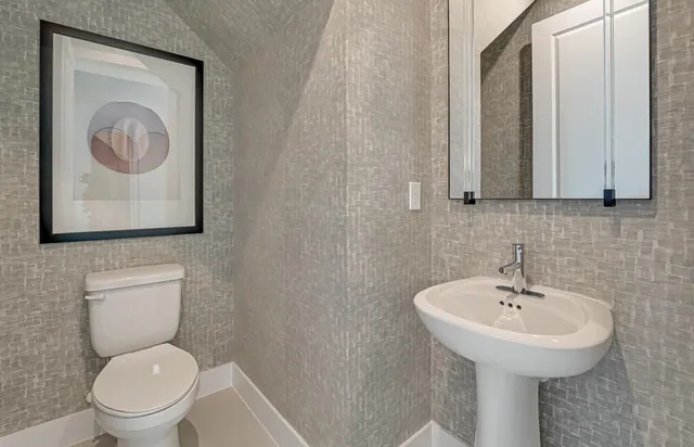 a living room with furniture large window and flat screen tv