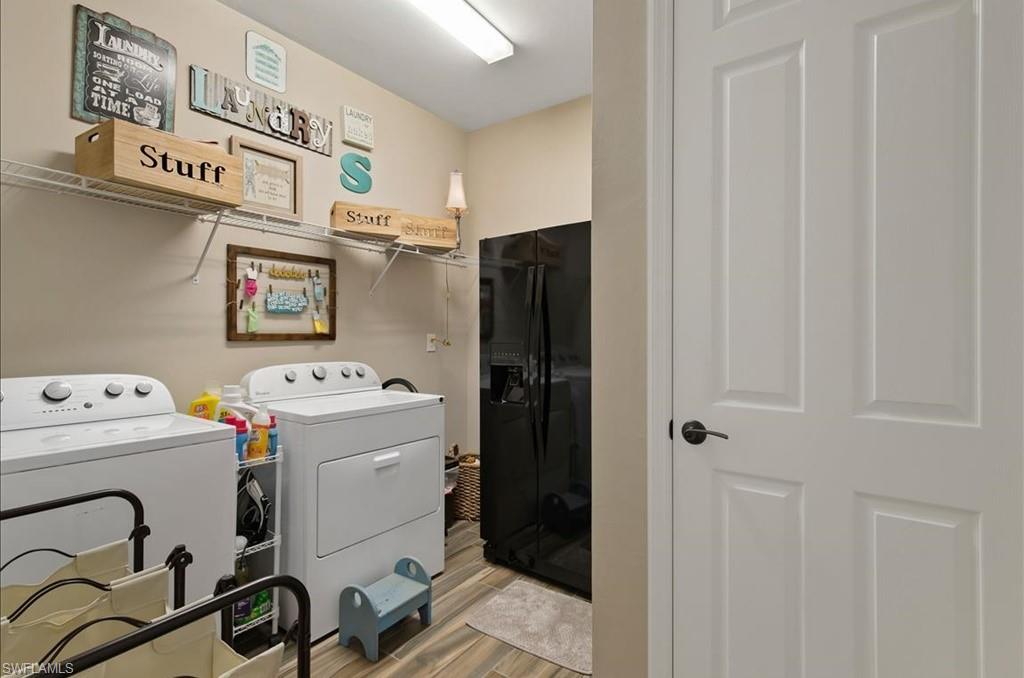 10809 Dennington Road Fort Myers, FL 33913 - Photo 22 of 30 a utility room with dryer and washer