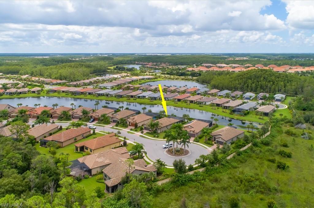 10809 Dennington Road Fort Myers, FL 33913 - Photo 24 of 30 an aerial view of residential houses with outdoor space