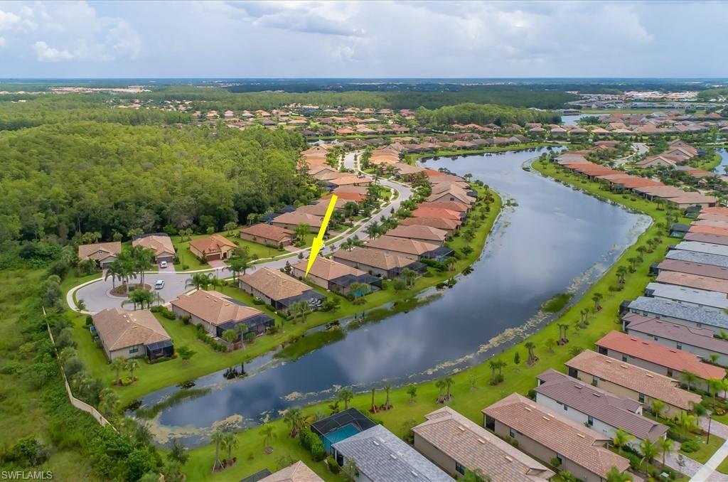 10809 Dennington Road Fort Myers, FL 33913 - Photo 25 of 30 an aerial view of a house with a garden