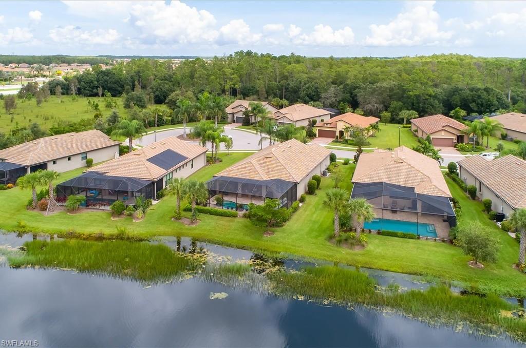 10809 Dennington Road Fort Myers, FL 33913 - Photo 27 of 30 an aerial view of residential houses with outdoor space and street view