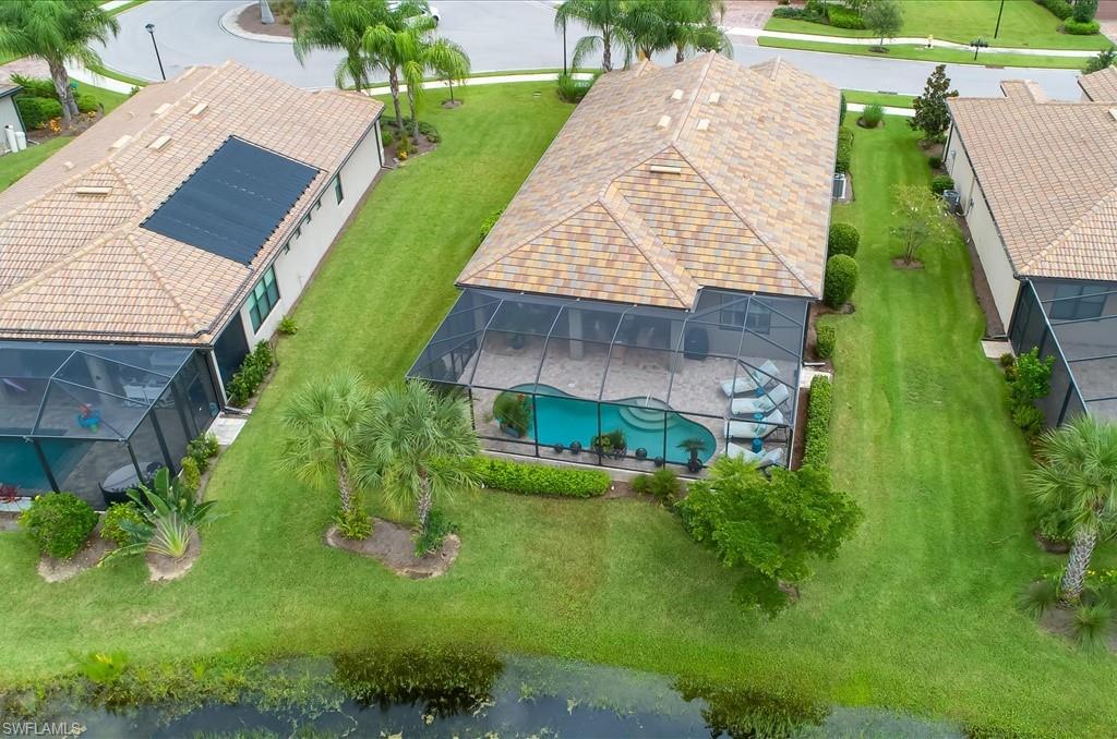 10809 Dennington Road Fort Myers, FL 33913 - Photo 28 of 30 an aerial view of a house with a garden and plants