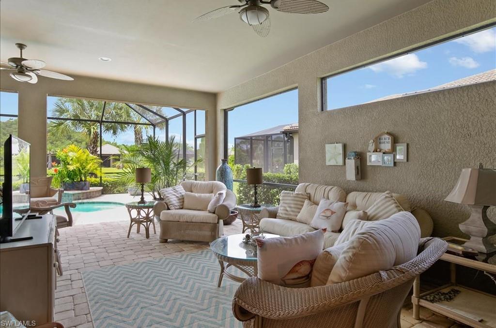 10809 Dennington Road Fort Myers, FL 33913 - Photo 6 of 30 a living room with furniture and a large window