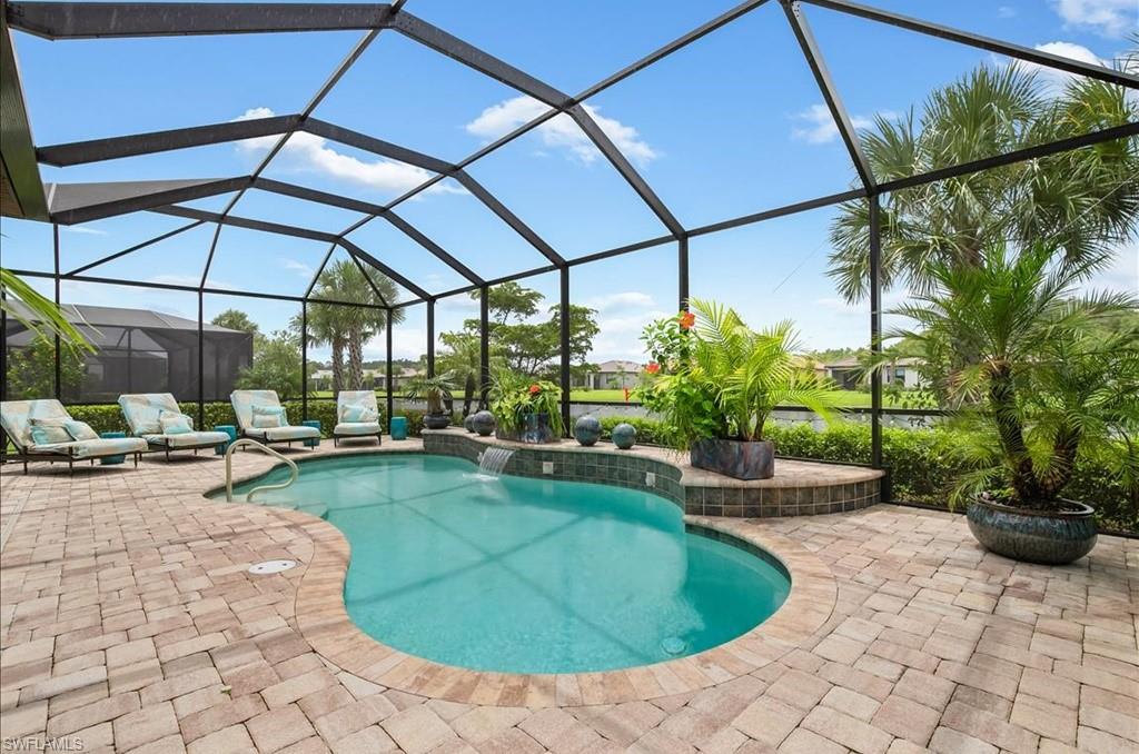 10809 Dennington Road Fort Myers, FL 33913 - Photo 8 of 30 a view of a swimming pool with a patio
