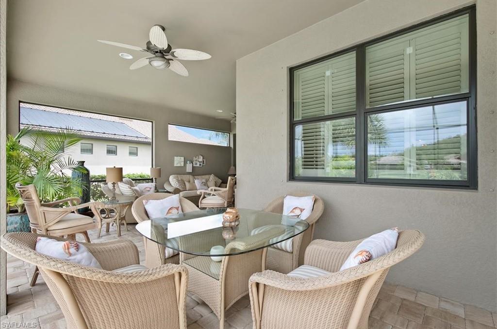 10809 Dennington Road Fort Myers, FL 33913 - Photo 9 of 30 a living room with furniture and a large window