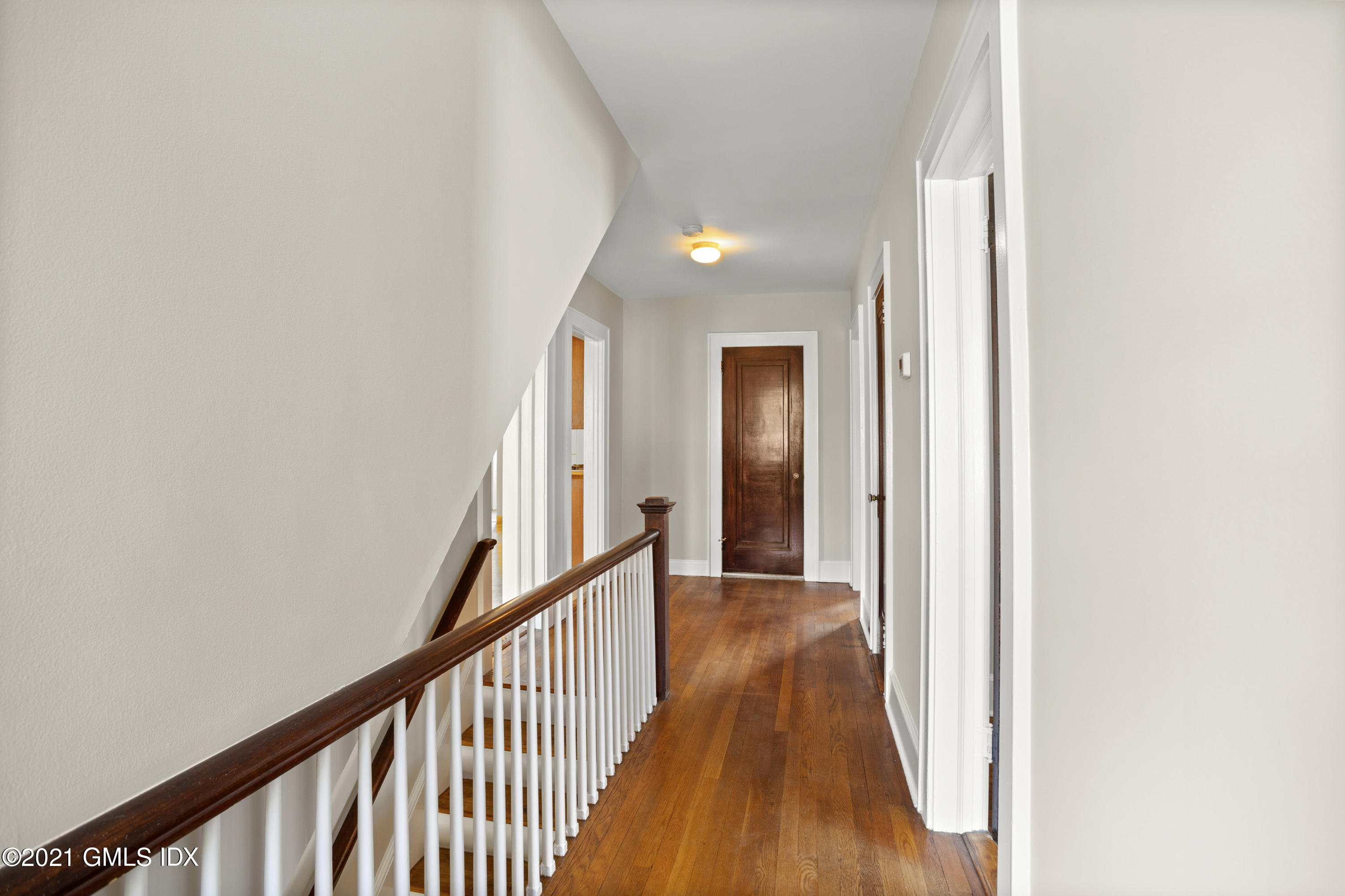 53 Richland Road Greenwich, CT 06830 - Photo 5 of 20 a view of a hallway with wooden floor