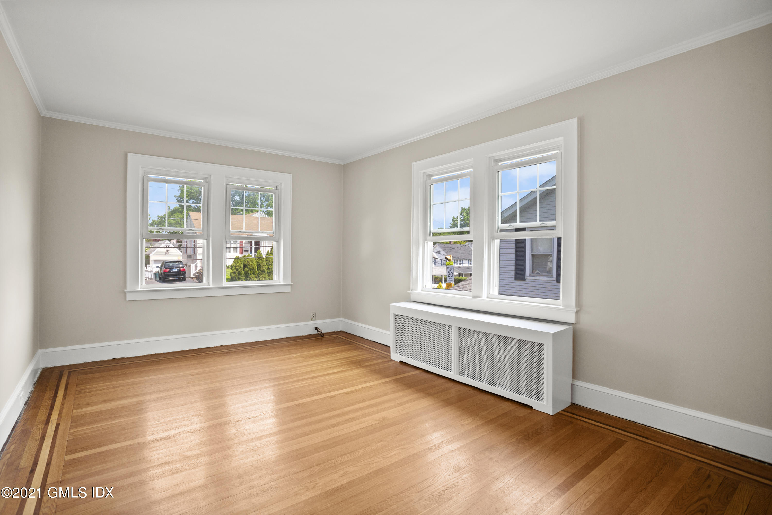 53 Richland Road Greenwich, CT 06830 - Photo 6 of 20 an empty room with windows