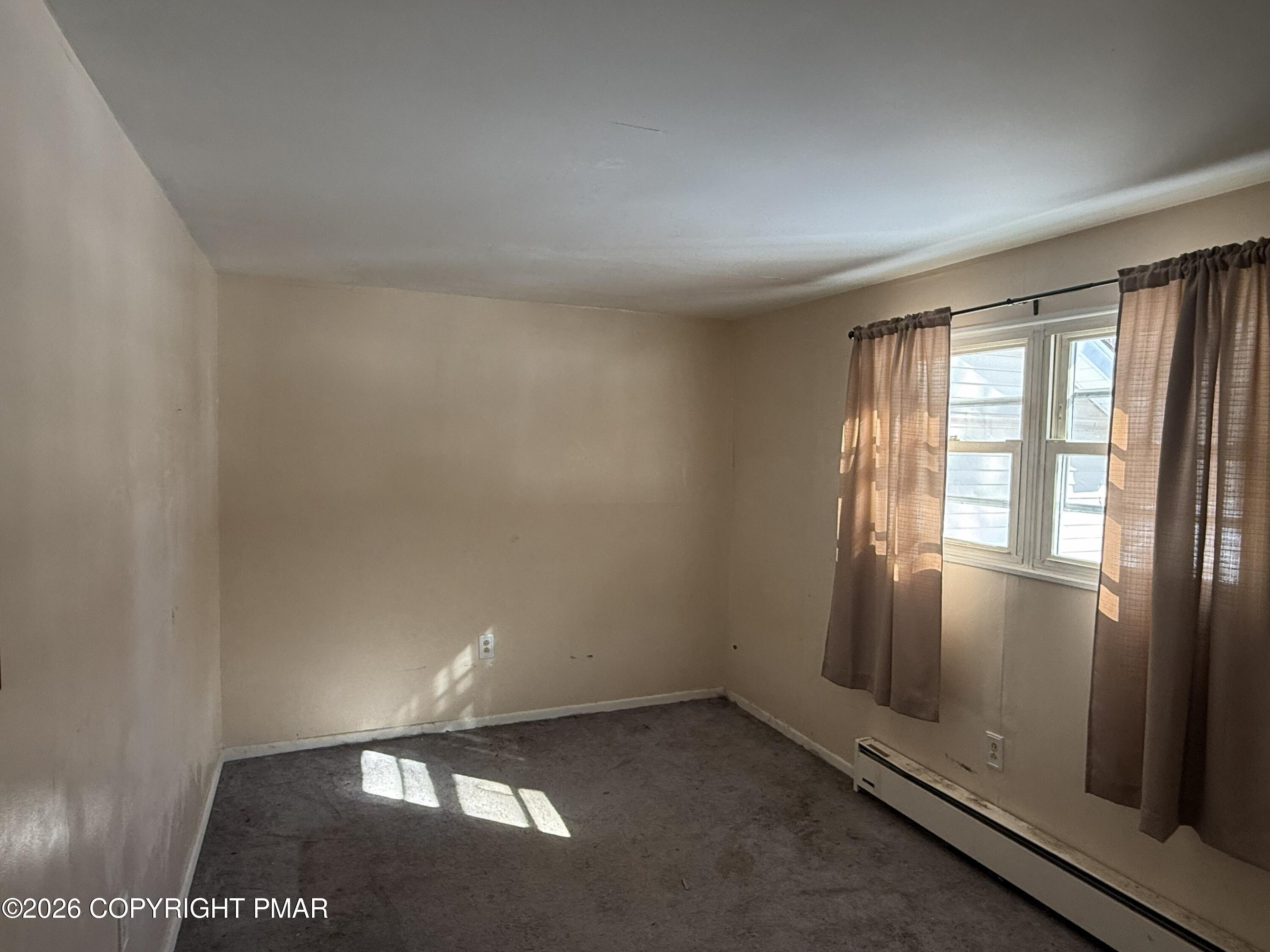 118 Buckhill Road Albrightsville, PA 18210 - Photo 9 of 17 a view of an empty room and window