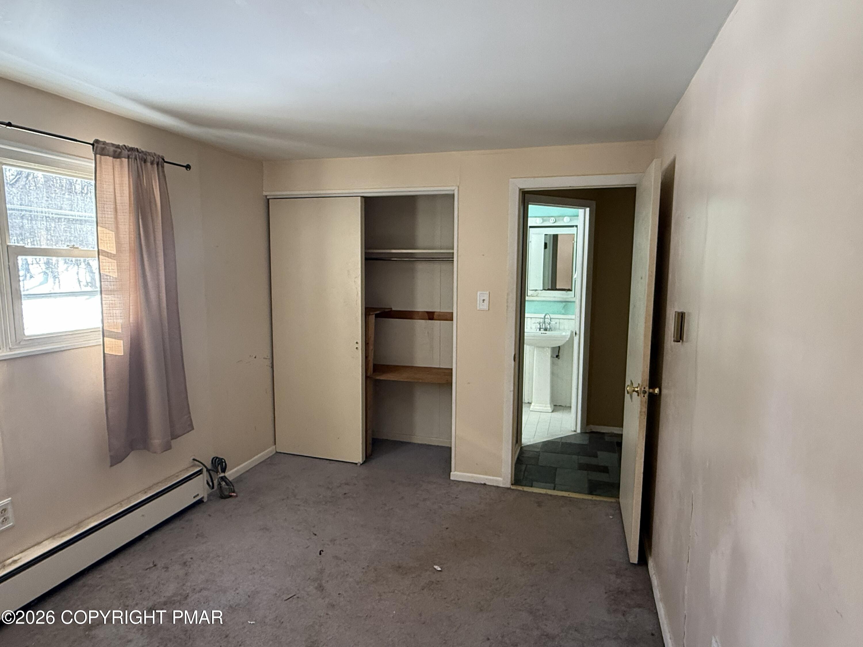 118 Buckhill Road Albrightsville, PA 18210 - Photo 10 of 17 an empty room with closet and windows