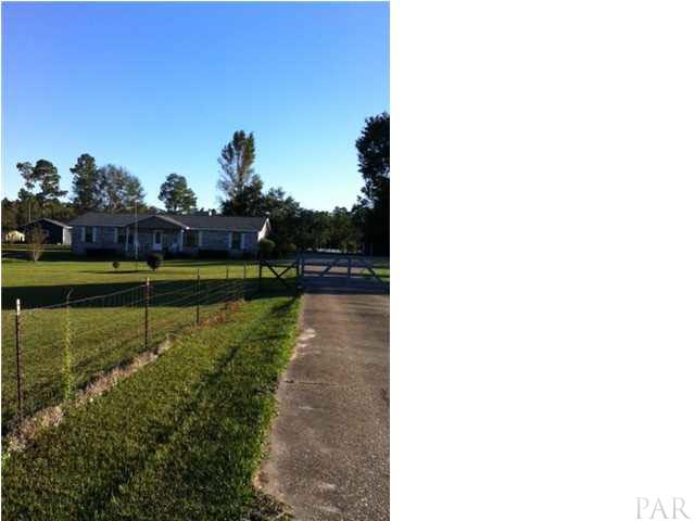 1991 Well Line Road Cantonment, FL 32533 - Photo 19 of 20 ENTRY LANE SHOWING FROM COUNTY ROAD. LOVELY FENCED AND CROSS FENCED FOR ALL YOUR NEEDS .