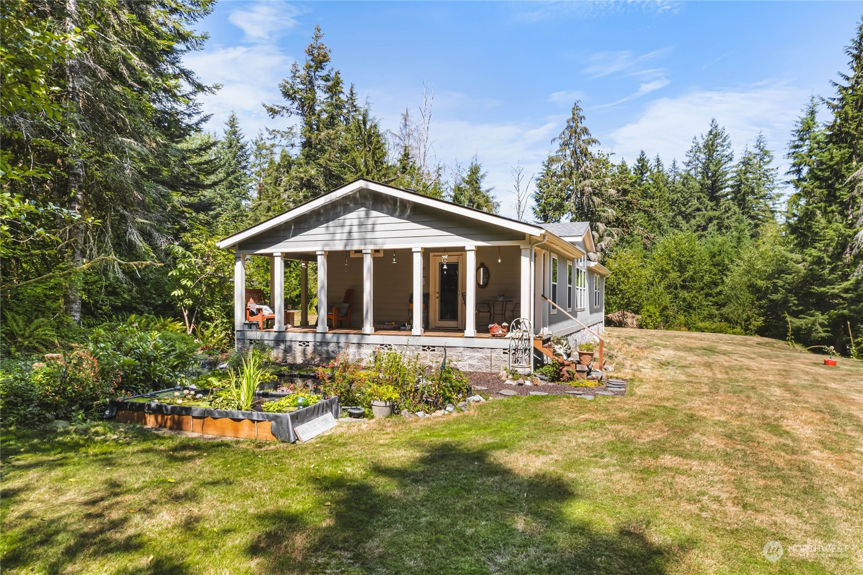 696 Oppelt Road Chehalis, WA 98532 - Photo 3 of 40 a front view of a house with yard porch and seating area