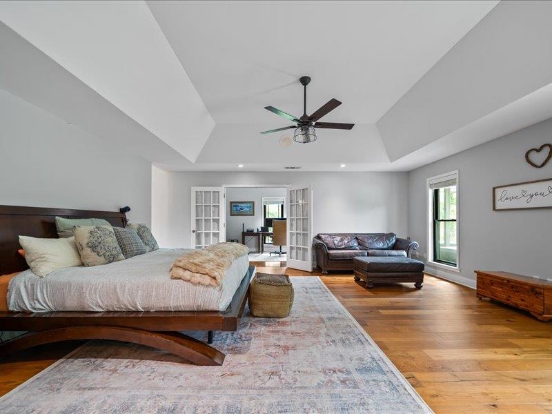 8104 Jack Bond Road Arlington, TN 38002 - Photo 14 of 40 a bedroom with a bed a couch and window