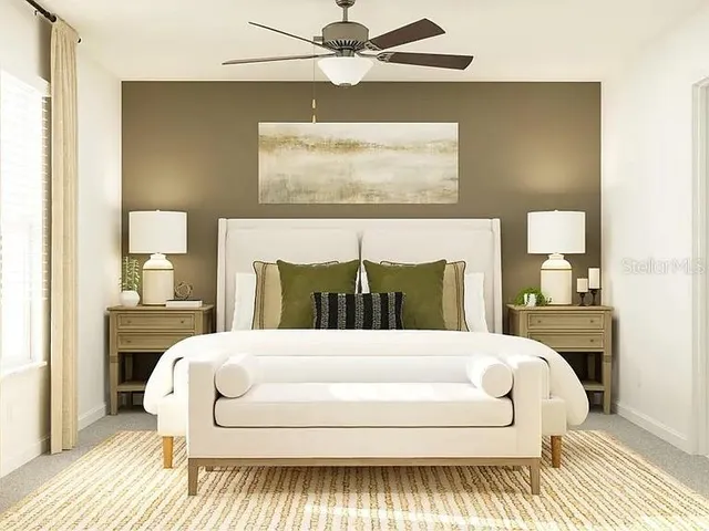 a bedroom with a bed and a mirror