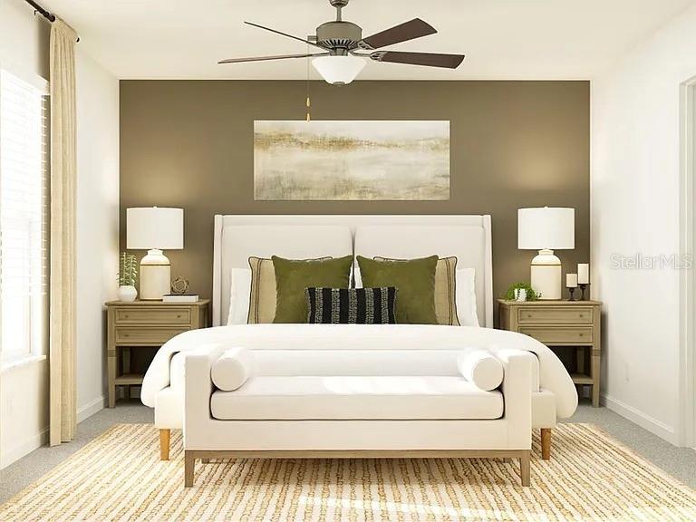 35008 Ackley Trace Zephyrhills, FL 33541 - Photo 4 of 11 a bedroom with a bed and a mirror