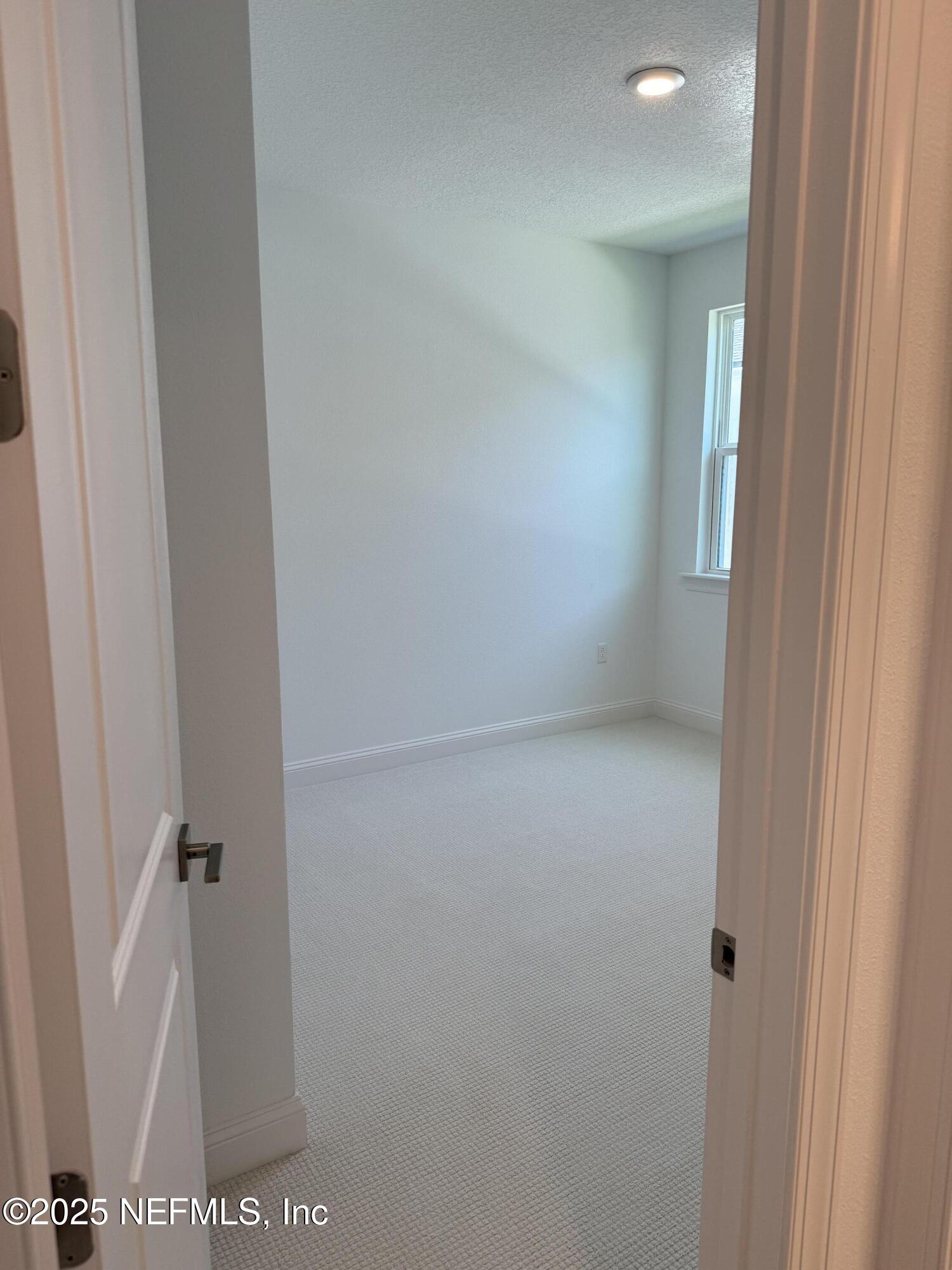 34 Mulberry Road Palm Coast, FL 32164 - Photo 14 of 63 a view of hallway with closet