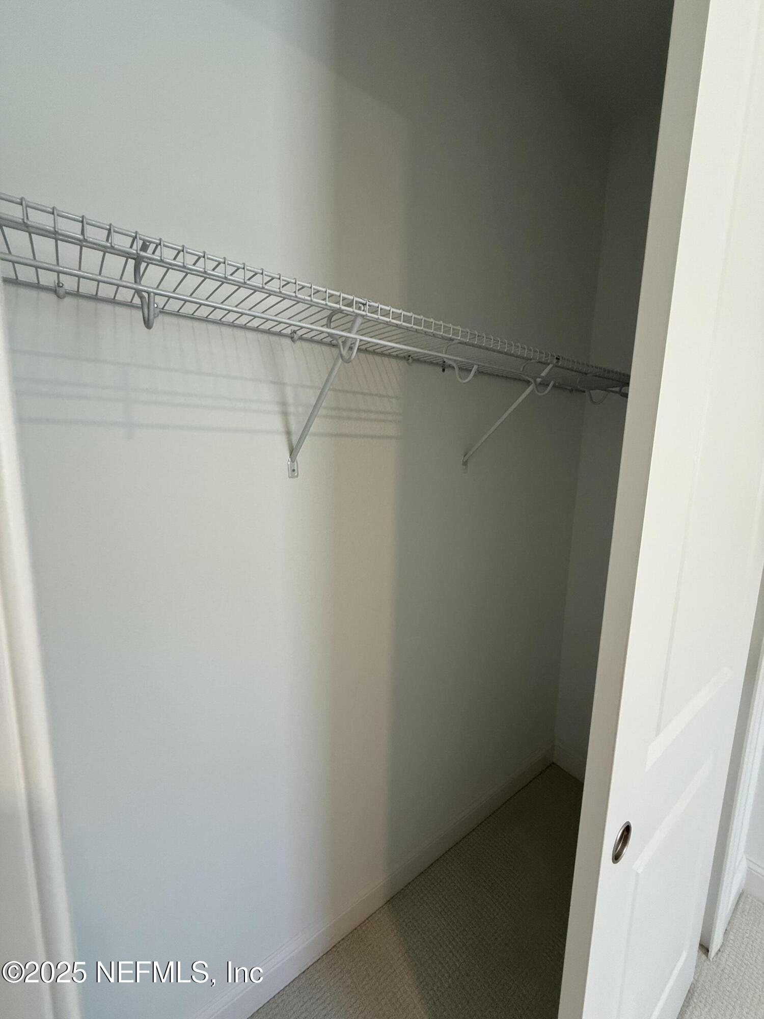 34 Mulberry Road Palm Coast, FL 32164 - Photo 16 of 63 a view of a rack on the wall
