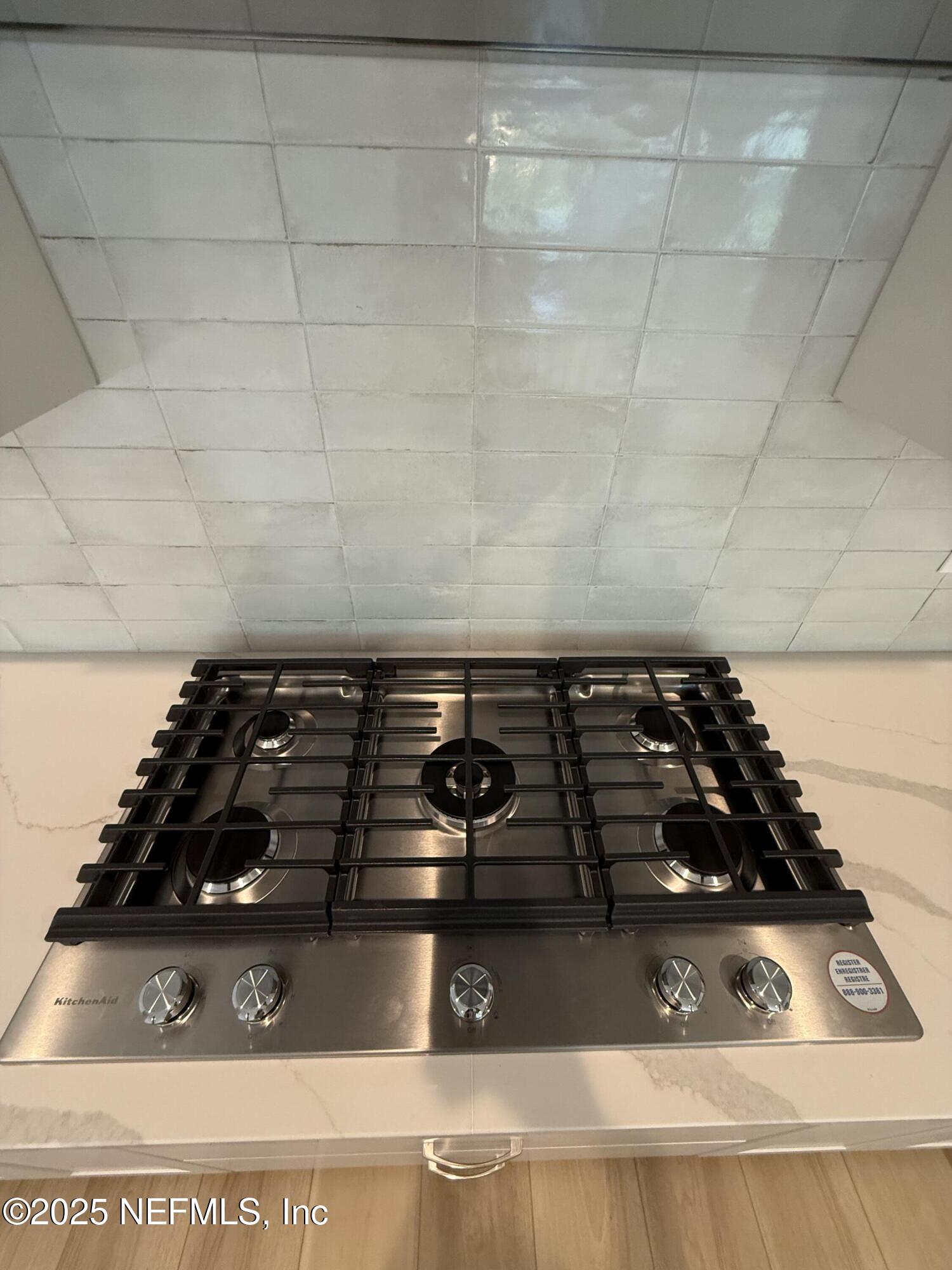 34 Mulberry Road Palm Coast, FL 32164 - Photo 22 of 63 a close up of a stove top oven sitting on a floor