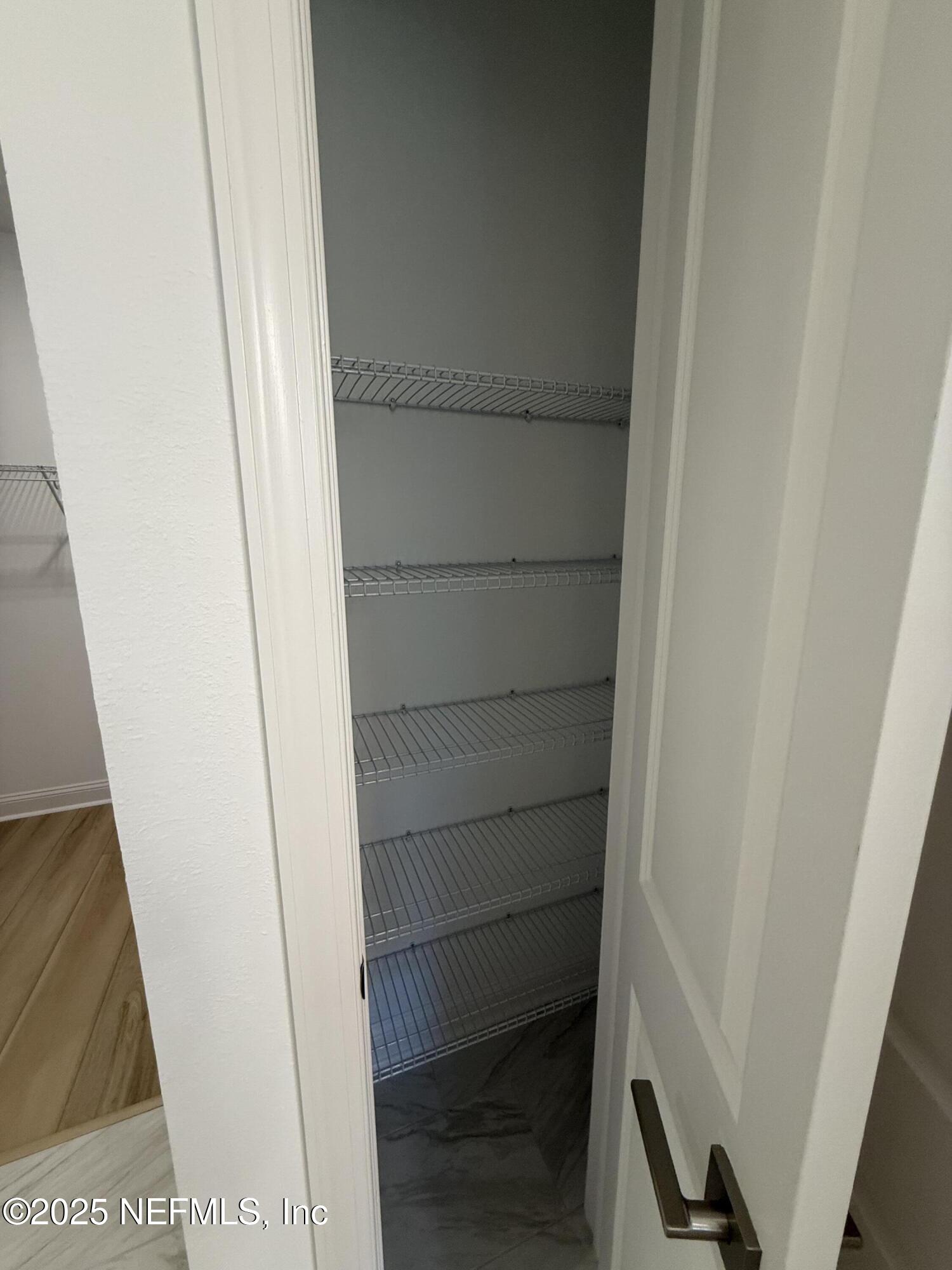 34 Mulberry Road Palm Coast, FL 32164 - Photo 49 of 63 a view of walk in closet