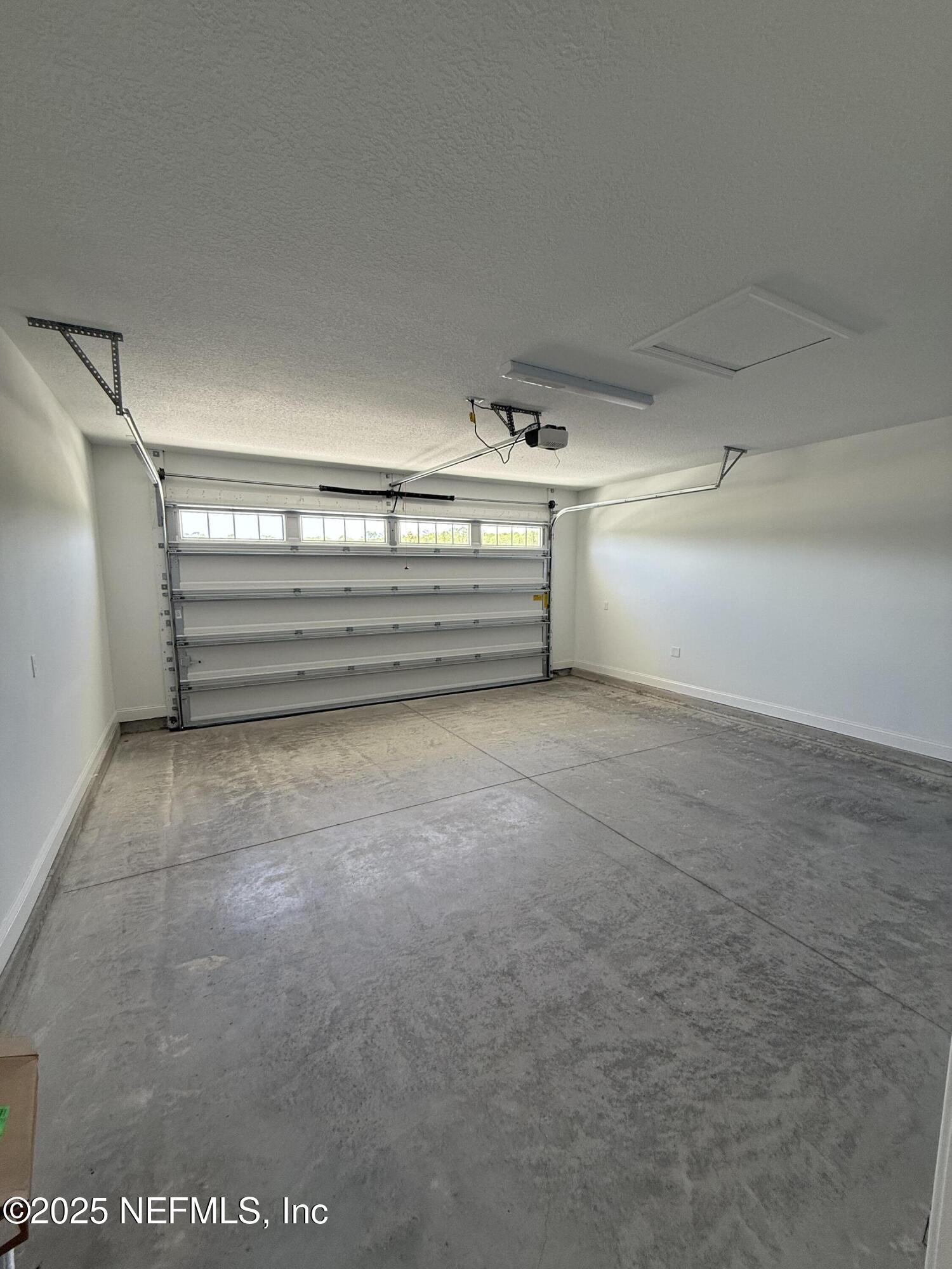 34 Mulberry Road Palm Coast, FL 32164 - Photo 7 of 63 a view of empty room with air conditioner and window