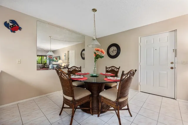 a view of a dining room and chandelier
