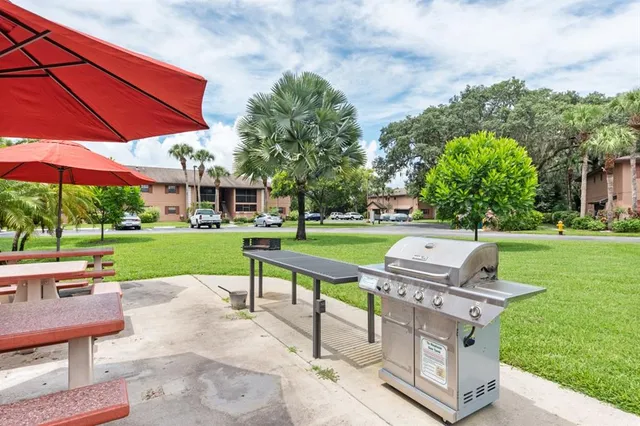 a view of a two chairs in a yard