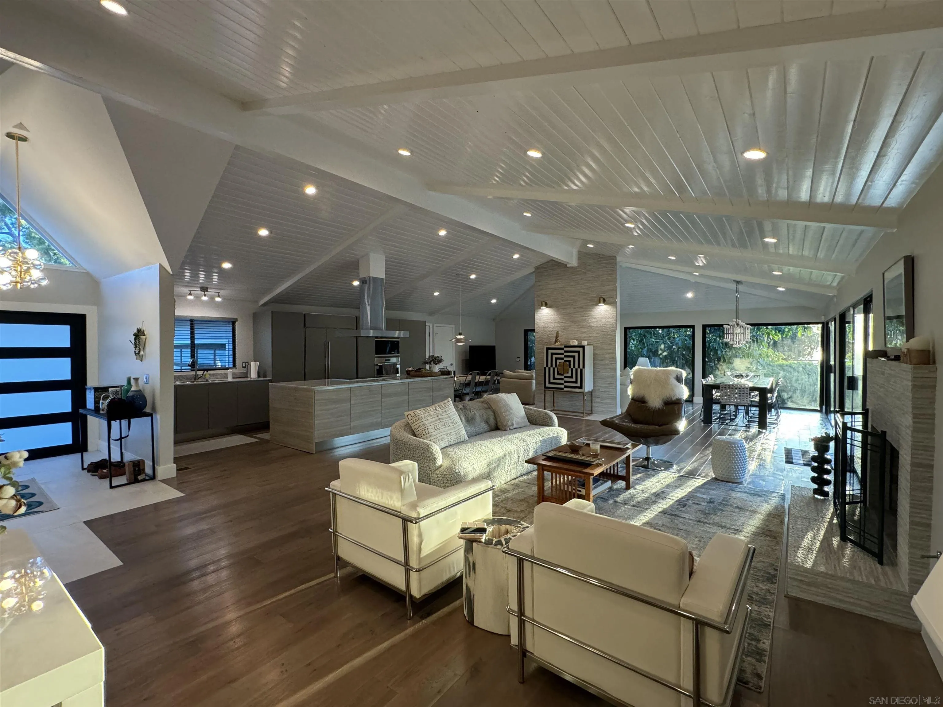 1402 Rodeo Drive La Jolla, CA 92037 - Photo 30 of 62 a living room with furniture and a large window