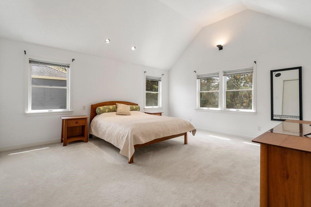 62 Lynn Road Needham, MA 02494 - Photo 11 of 24 a bedroom with a bed and wooden floor