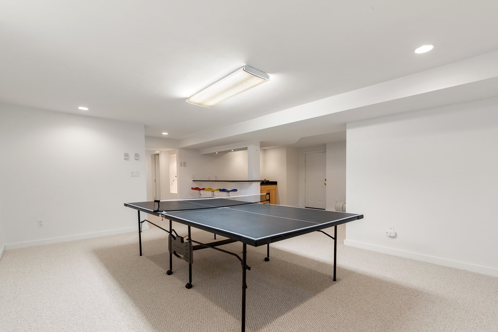 62 Lynn Road Needham, MA 02494 - Photo 20 of 24 a view of a room with furniture and wooden floor