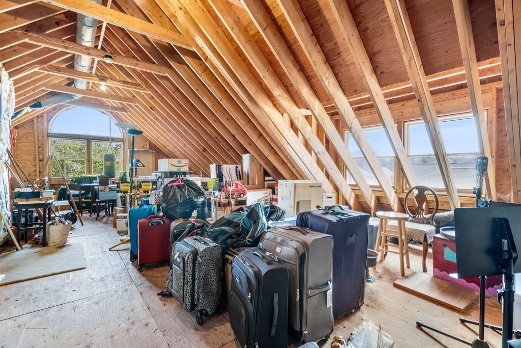 62 Lynn Road Needham, MA 02494 - Photo 21 of 24 a view of a chairs and tables in patio with a barbeque