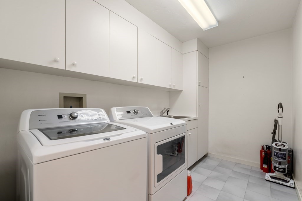 62 Lynn Road Needham, MA 02494 - Photo 10 of 24 a utility room with dryer and washer