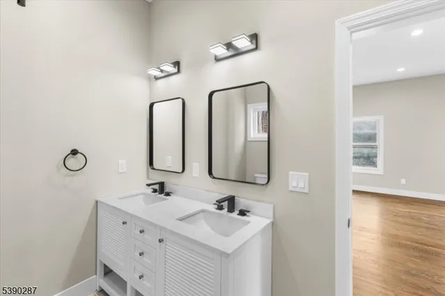 a utility room with a sink washer and dryer