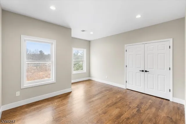 a view of a house with backyard