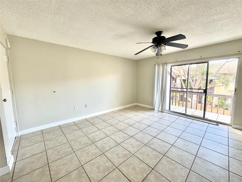 2732C Hidden Lake Boulevard, Unit D Sarasota, FL 34237 - Photo 5 of 19 a view of an empty room and a window