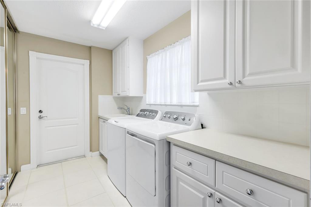 3333 Cayman Lane Naples, FL 34119 - Photo 27 of 43 a view of a storage and utility room with a window
