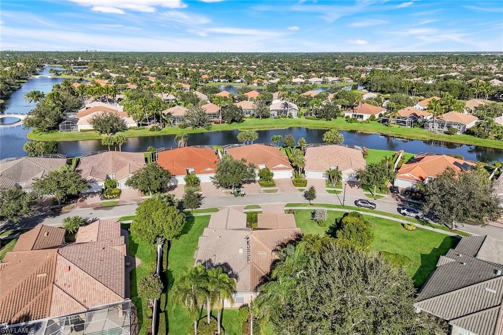 3333 Cayman Lane Naples, FL 34119 - Photo 33 of 43 an aerial view of a house with outdoor space