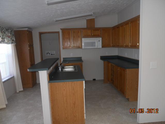 1131 Deer Ridge Road Kingston Springs, TN 37082 - Photo 12 of 12 KITCHEN HAS BAR