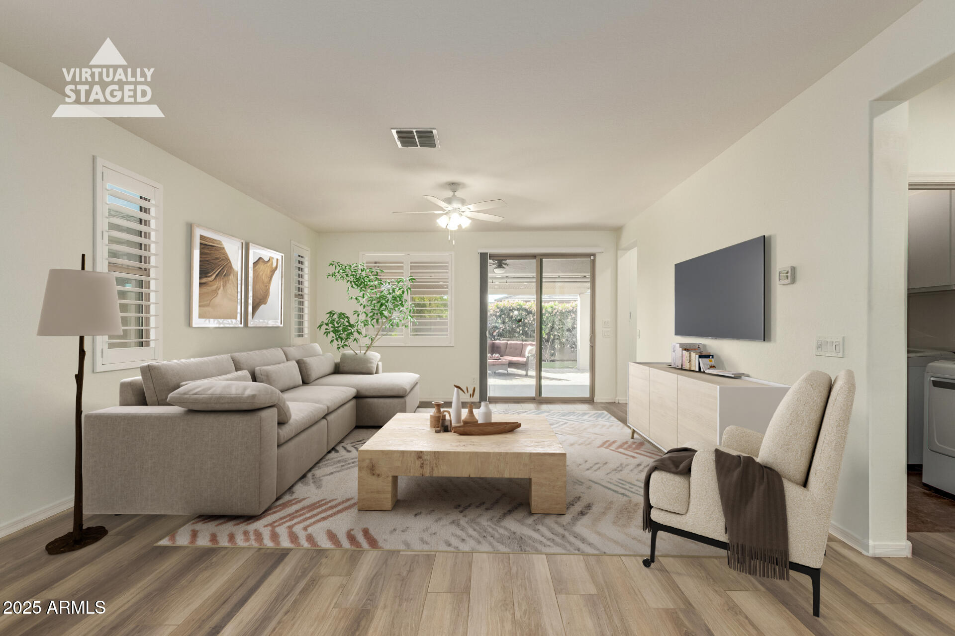 5660 South Colt Mesa, AZ 85212 - Photo 14 of 34 a living room with furniture and a flat screen tv