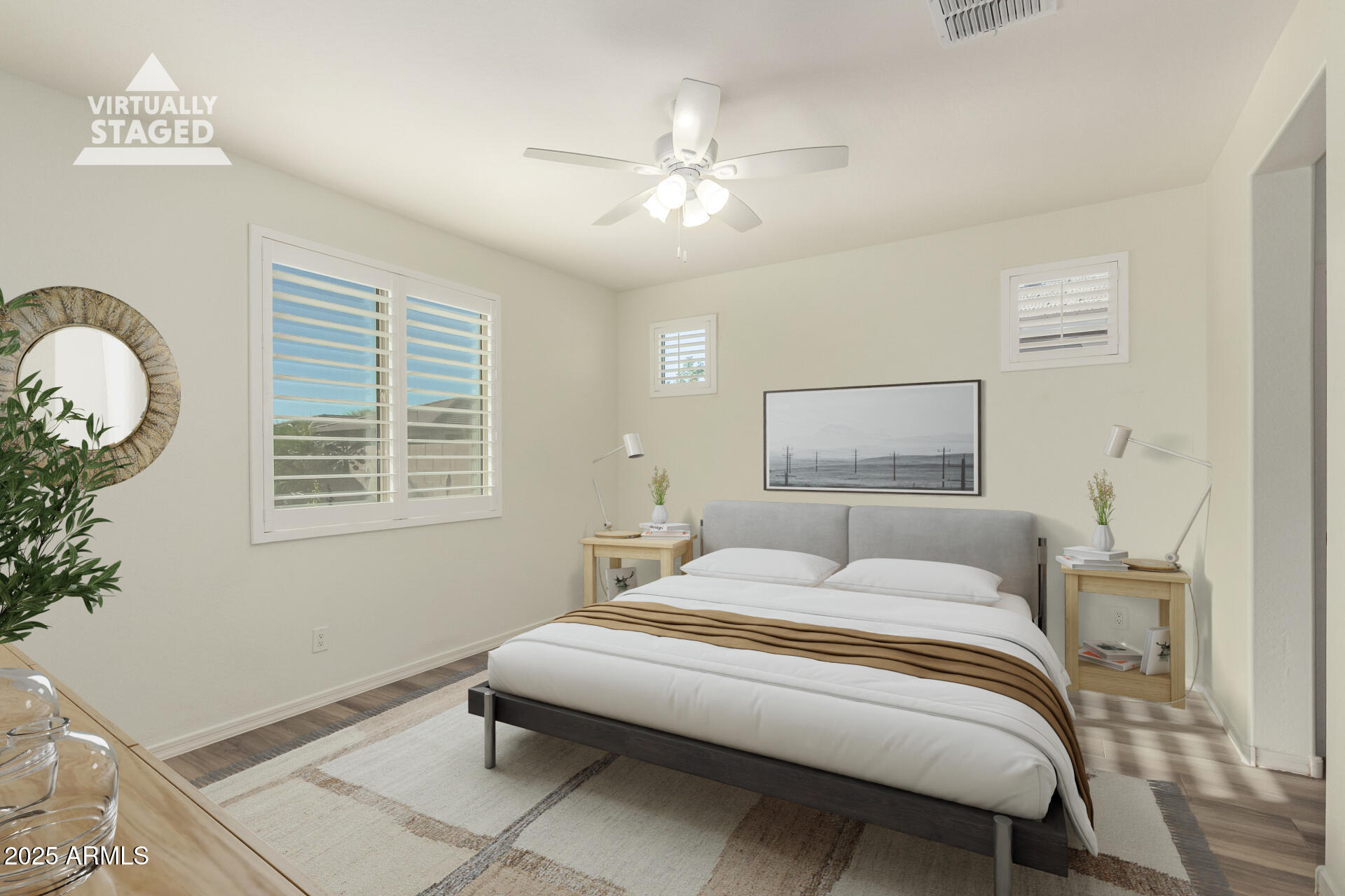 5660 South Colt Mesa, AZ 85212 - Photo 17 of 34 a bedroom with a large bed and a chandelier