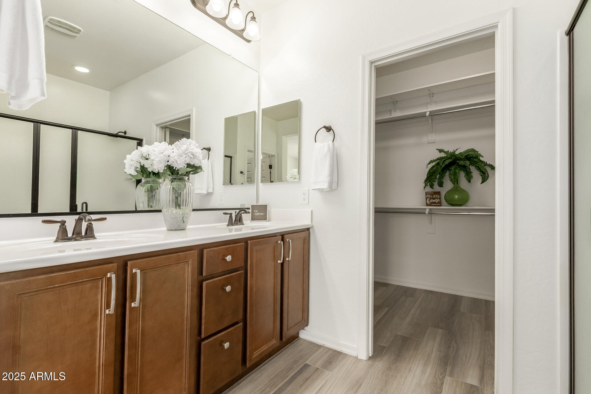 5660 South Colt Mesa, AZ 85212 - Photo 18 of 34 a bathroom with a sink and a mirror