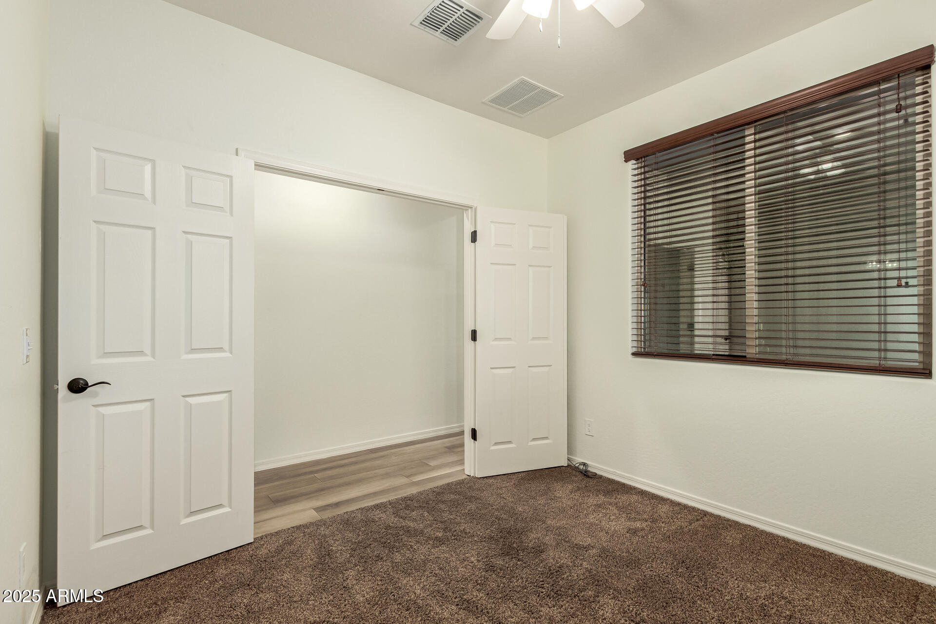 5660 South Colt Mesa, AZ 85212 - Photo 22 of 34 a view of an empty room with a window