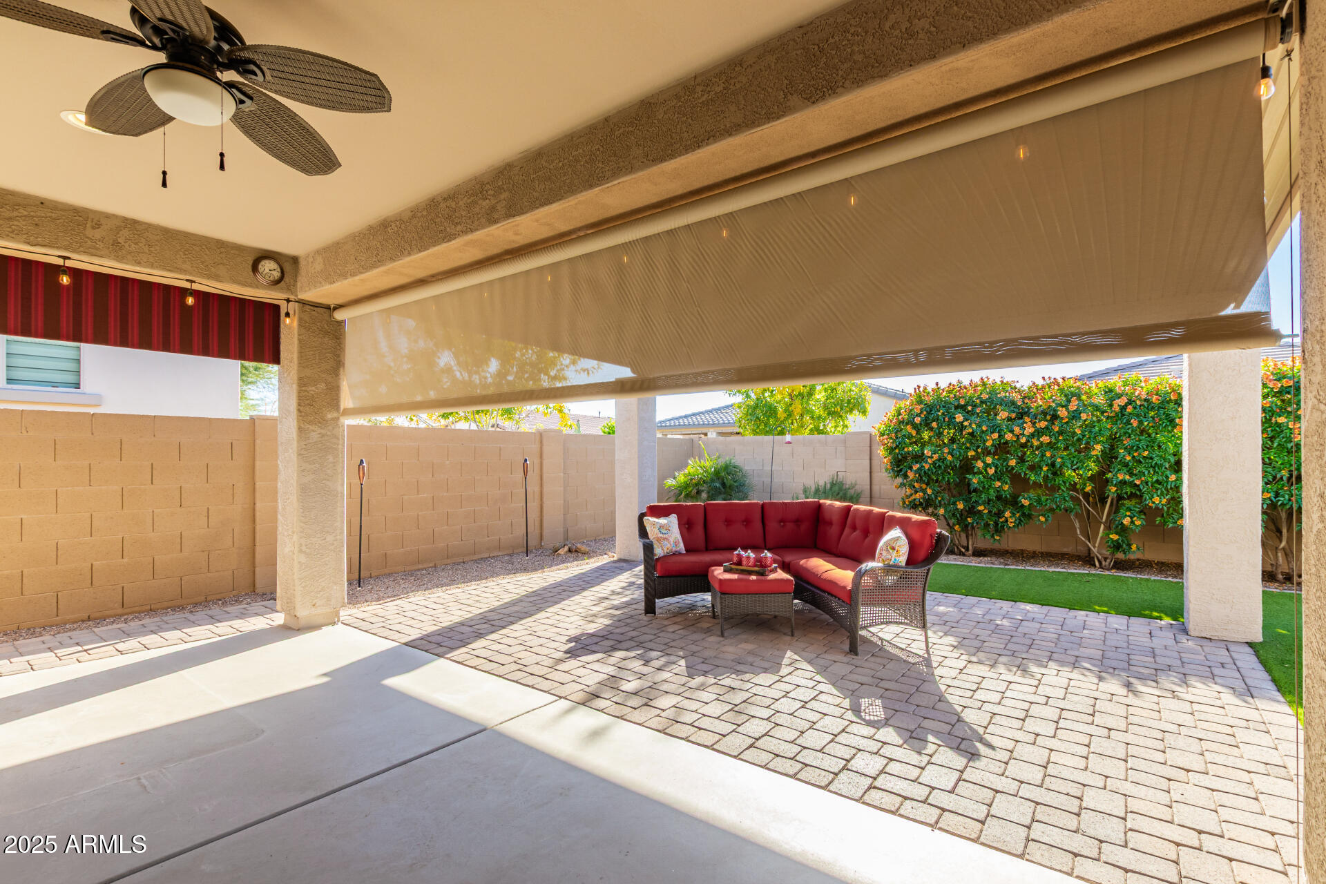 5660 South Colt Mesa, AZ 85212 - Photo 27 of 34 a backyard of a house with yard and outdoor seating