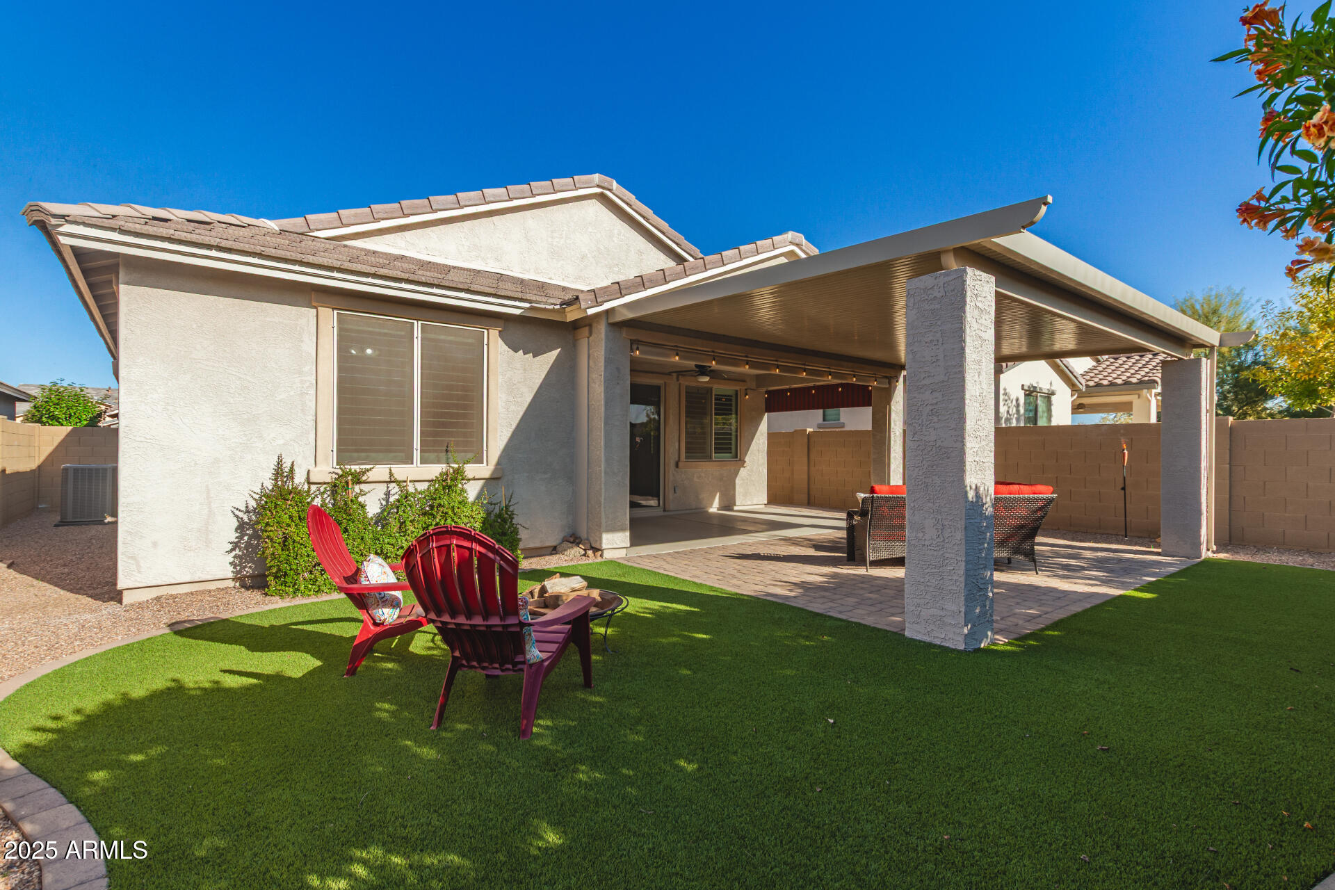 5660 South Colt Mesa, AZ 85212 - Photo 28 of 34 a view of a chair and table in backyard of the house