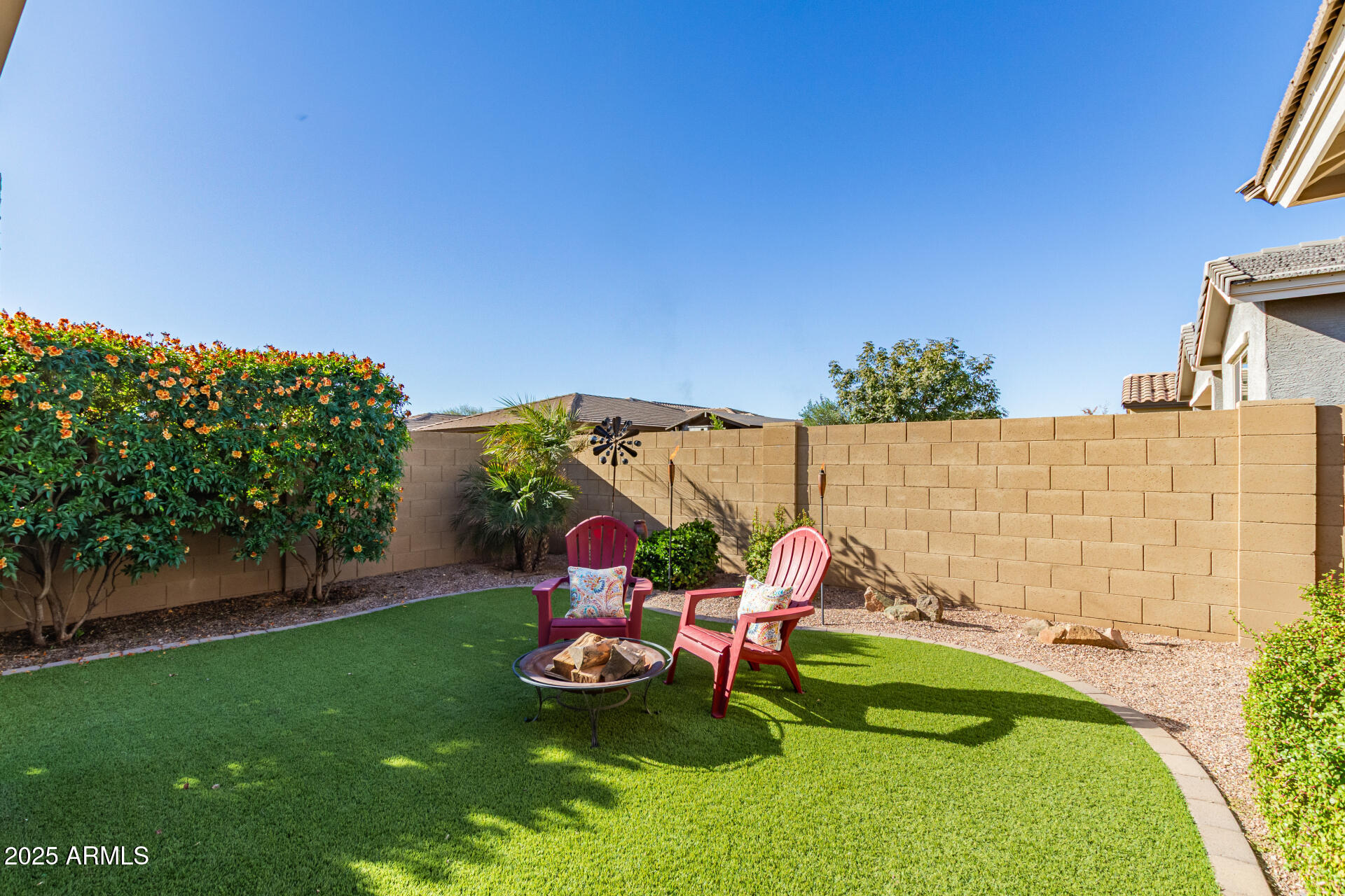 5660 South Colt Mesa, AZ 85212 - Photo 6 of 34 a backyard of a house with table and chairs